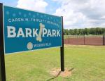 New Bark Park Sign in front of new dog park