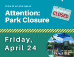 Blue and green closure notice with playground in lower right corener