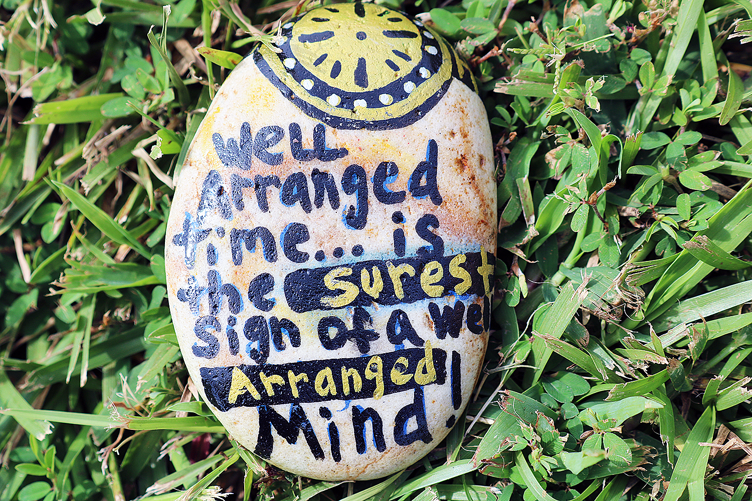 Painted rock with words of encouragement