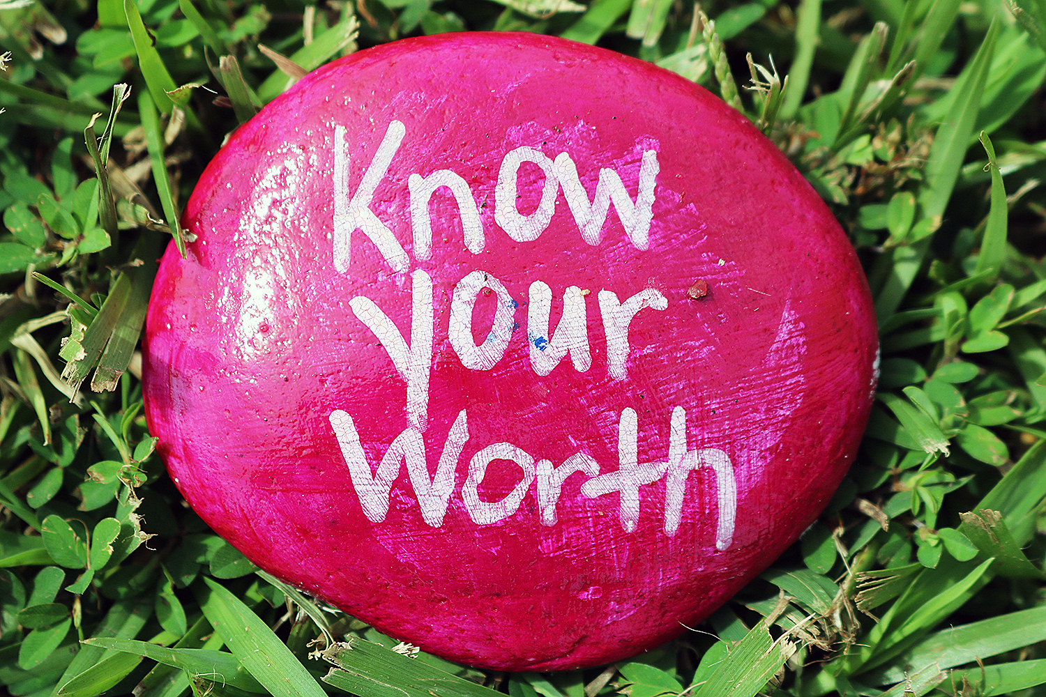 Painted rock with words of encouragement