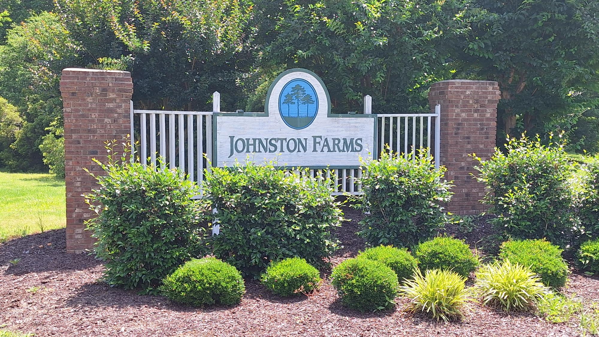 Johnston Farms sign at entrance of subdivision.