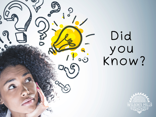 Woman thinking with cartoon light bulb and question marks over her head