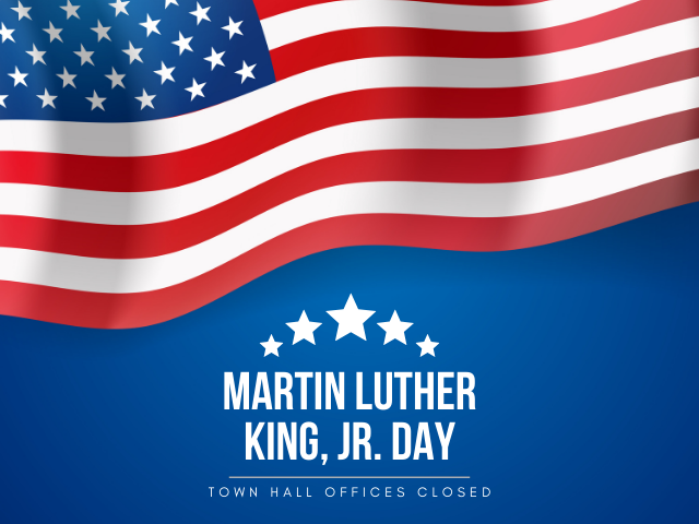 American flag waving over blue background with 5 stars below